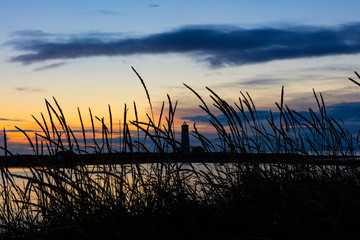 Grotta Island Lighthouse, located off the Atlantic Ocean coast near the city of Reykjavik, Iceland,...