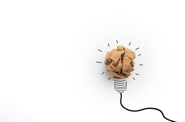 Idea with brown crumpled paper ball ( lightbulb ).Concept creative idea and innovation with paper ball.Doodle art concept,illustration painting