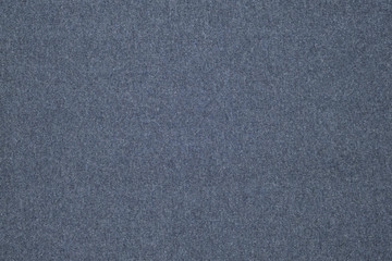 Fototapeta na wymiar Knitted indigo fabric, jersey cloth background.