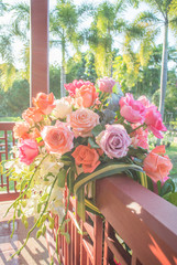 Blurry rose and warm light in garden background , beautiful moments of love and happy life.