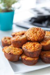 Pile of fresh breakfast muffins in a kitchen