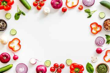 Cook frame with fresh vegetables on white background top view space for text