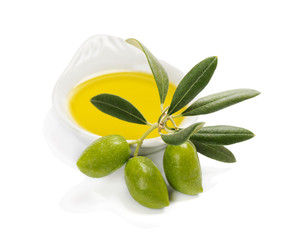 Olive fruit and olive oil in a bowl