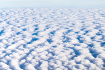 Blue sky and Cloud Top view from airplane window,Nature background.