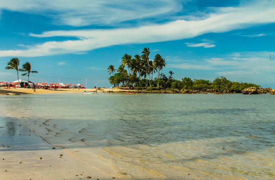 Tranquil and clear waters of Morro de S&atilde;o Paulo beach in Bahia, a tropical paradise with preserved nature, offering a serene and idyllic escape in Brazil's coastal beauty.