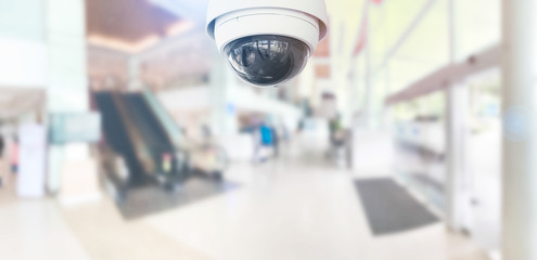 CCTV Security Camera operating in hospital on blur background.