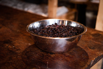 Bowl of food on the wood table.