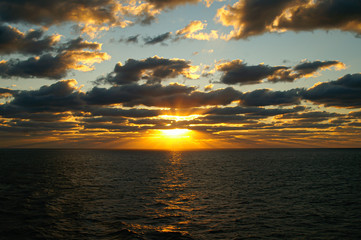 Atlantic ocean sunset with sun centered