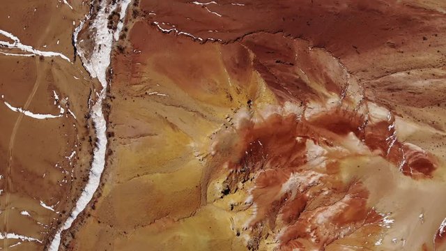 Red colored mountains aerial vertical shot