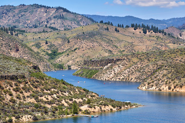 Fototapeta na wymiar Water reservoir on a summer day from a high angle on drive from Boise to Sawtooth Mts