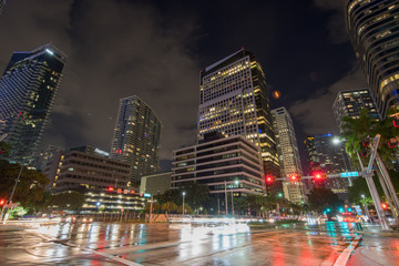 Night photo of Brickell Miami. Roads are wet after rain storm