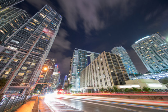 View from Brickell Avenue Downtown city scene. Long exposure trailing lights shot with ultrawide lens