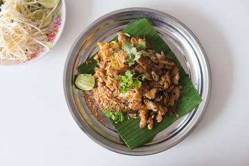 Fried mussel pancakes and Pad Thai in dish