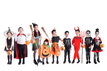 Group of many asian children wearing and makeup for Halloween celebration standing over white...
