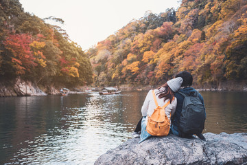 Young couple traveler looking beautiful landscape at arashiyama Japan, Travel lifestyle concept