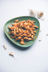 Garlic Fry or Tala Hua Lahsun in hindi, is a popular side dish or snacks from maharashtra, India