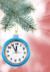 Image of beautiful festive designer christmas decorations. Christmas toys on the Christmas tree in the form of a clock