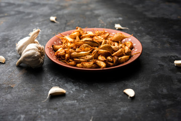 Garlic Fry or Tala Hua Lahsun in hindi, is a popular side dish or snacks from maharashtra, India