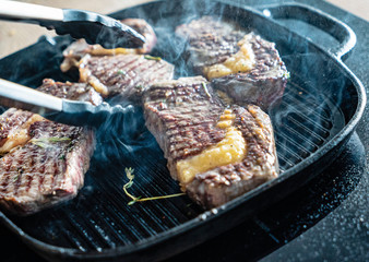 grilled steaks on the pan