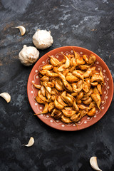Garlic Fry or Tala Hua Lahsun in hindi, is a popular side dish or snacks from maharashtra, India