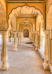 Fototapeta na wymiar Arches inside the Amber fort palace at Amer near Jaipur, Rajasthan, India