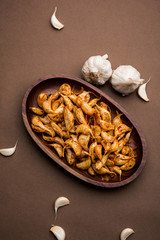 Garlic Fry or Tala Hua Lahsun in hindi, is a popular side dish or snacks from maharashtra, India