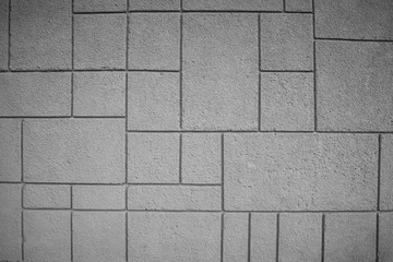 Fototapeta premium Pattern, pattern of white concrete blocks. Wall or sidewalk. rough texture.