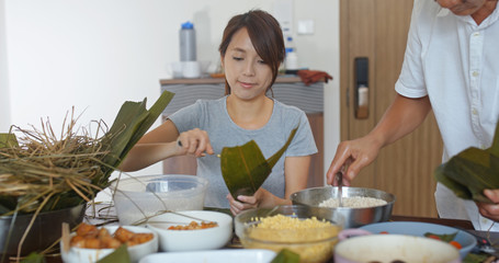 Chinese woman make rice dumpling