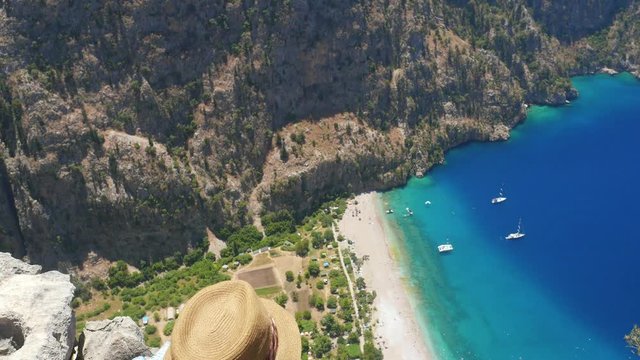 Two young woman enjoying beautiful view of The Butterfly Valley in Fethiye, Turkey