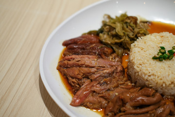 Stewed pork leg on rice.