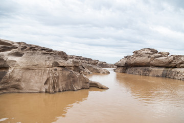 River Island. Rocks from water erosion. 