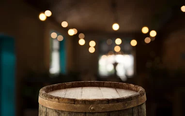 Rolgordijnen background of barrel and worn old table of wood © kishivan
