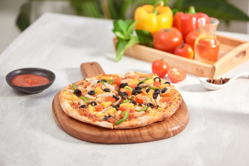 Appetizing homemade pizza on a white background