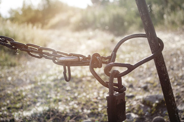 Chain with closed lock, closed gate