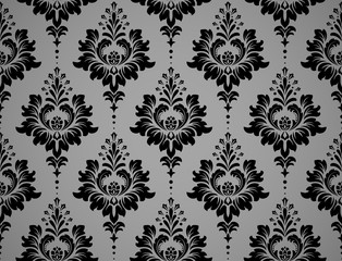 Wallpaper in the style of Baroque. Seamless vector background. Black and grey floral ornament. Graphic pattern for fabric, wallpaper, packaging. Ornate Damask flower ornament