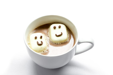 cute marshmallow smile face on hot coffee