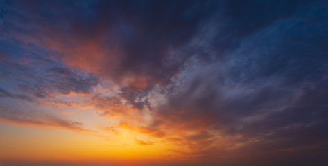 Fototapeta na wymiar Fiery sunset, colorful clouds in the sky