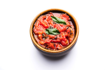 Tomato/tamatar chutney or sauce, served in a bowl. selective focus