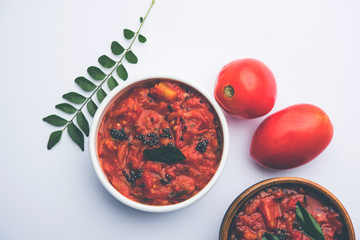 Tomato/tamatar chutney or sauce, served in a bowl. selective focus