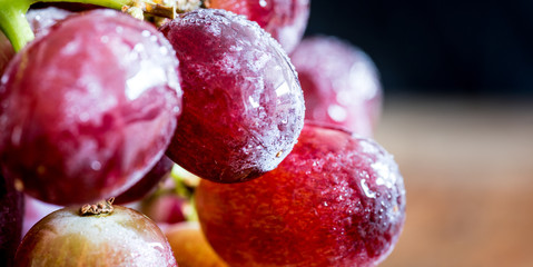 Fresh organic grapes isolated on vintage table