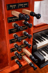 Beautiful detail of a wind organ as a religious musical instrument