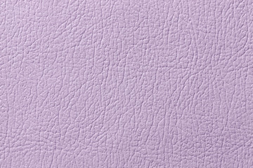 Light purple leather texture background, closeup. Lilac cracked backdrop