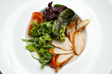 meat salad with a egg and greens