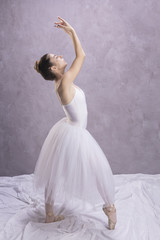 Fototapeta premium Side view ballerina standing position