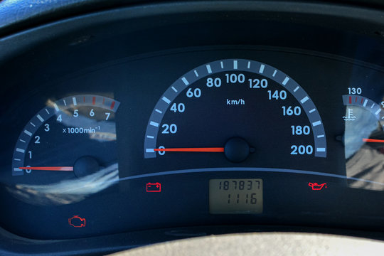 Car speedometer and tachometer close-up. Car abstract background for design and design.