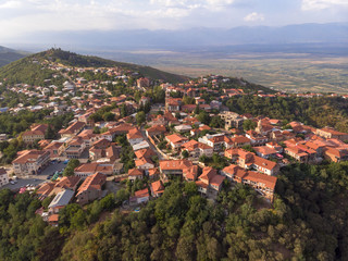 Fototapeta premium red roof in the city love above drone
