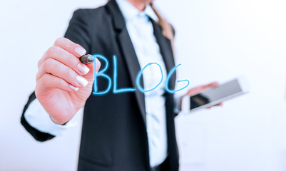 Writing note showing Blogquestion. Business concept for regularly updated website web page run by individual Digital business in black suite concept with business woman