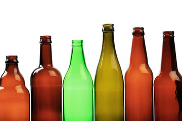 set of empty beer bottles on  white background - Image