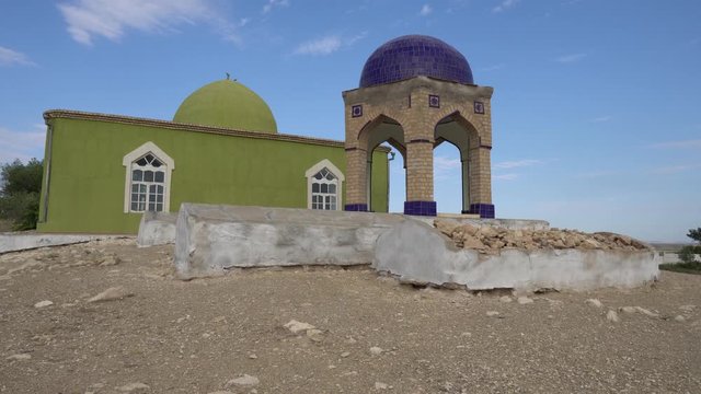 Shahrtuz Shahritus Chiluchor Chashma Springs Green Colored Mausoleum of Kambar Bobo with Pavilion on a Sunny Blue Sky Day