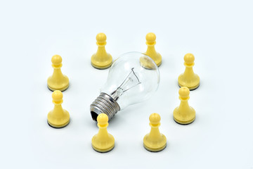 The concept is the generation of ideas, brainstorming, teamwork. The light is off, no ideas.